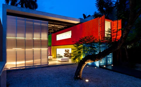 Brightly coloured containers with a furniture shop inside