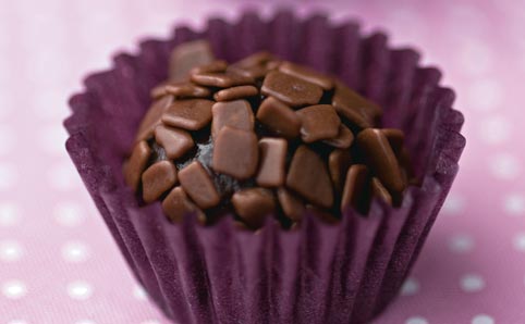 Traditional brigadeiro in a paper cup